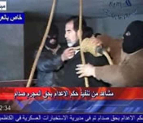 Mixed emotions, celebrations follow Saddam's death